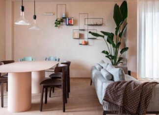 Spazi fluidi e continuità materica: la trasformazione di un appartamento a Porto San Giorgio